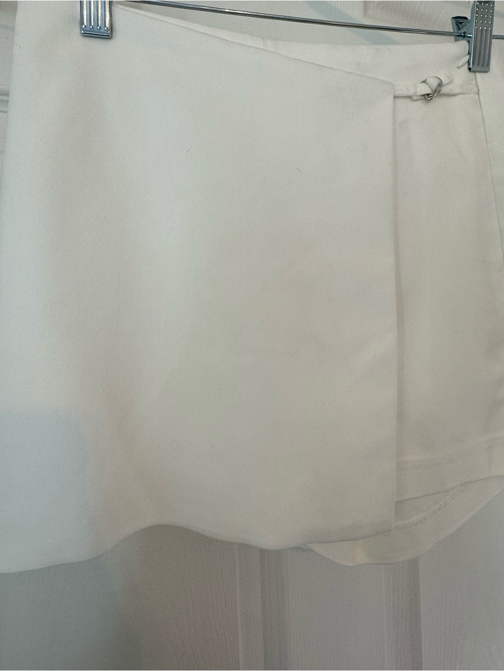 Dynamite white asymmetrical wrap skort in size 00 — New With Tags.